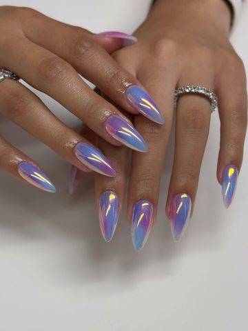 Manicured hands with long glossy nails