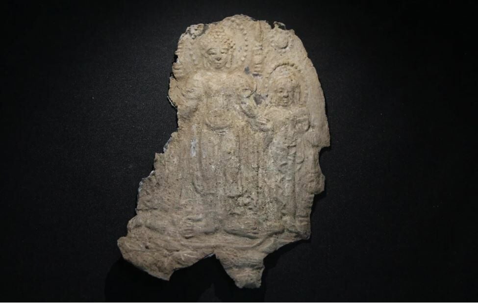 Repoussé panel featuring a standing Buddha, found beneath a Thai temple. Credit: Thailand’s Fine Arts Department