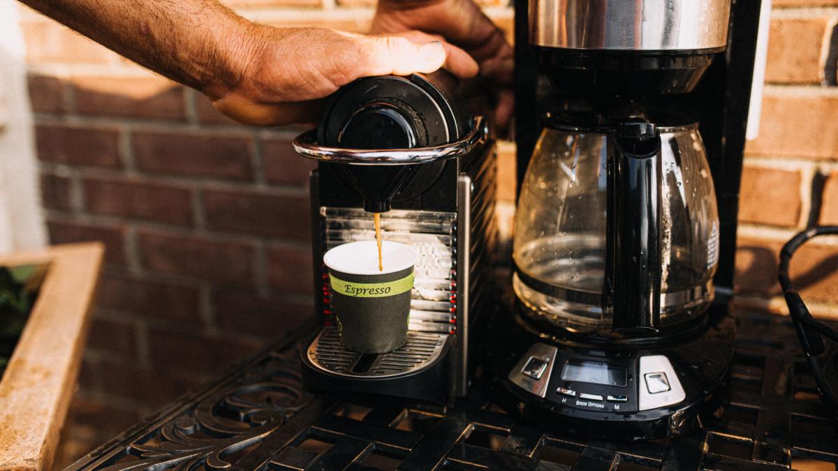 pod coffee maker next to drip coffee maker