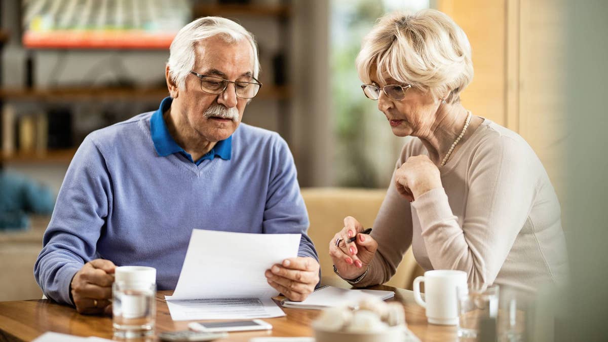 retired-couple-with-documents-at-home