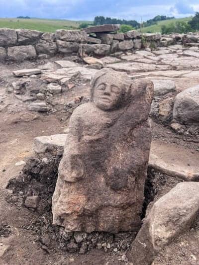 Carved stone depicting a Genius in situ. Credit: Vindolanda Charitable Trust.