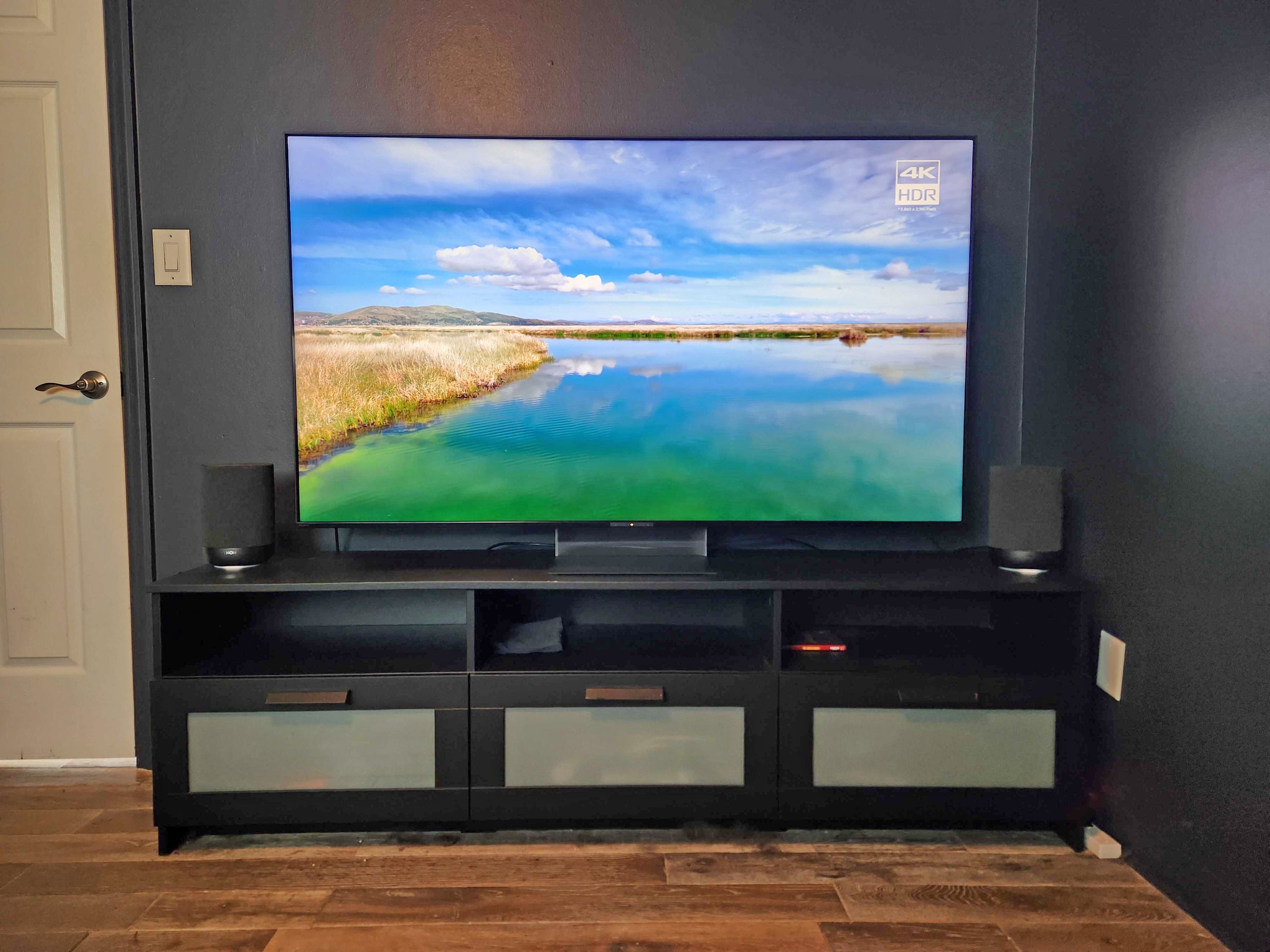 A Sony Bravia 7 II True RGB TV on a media console in our reviewer's home office.