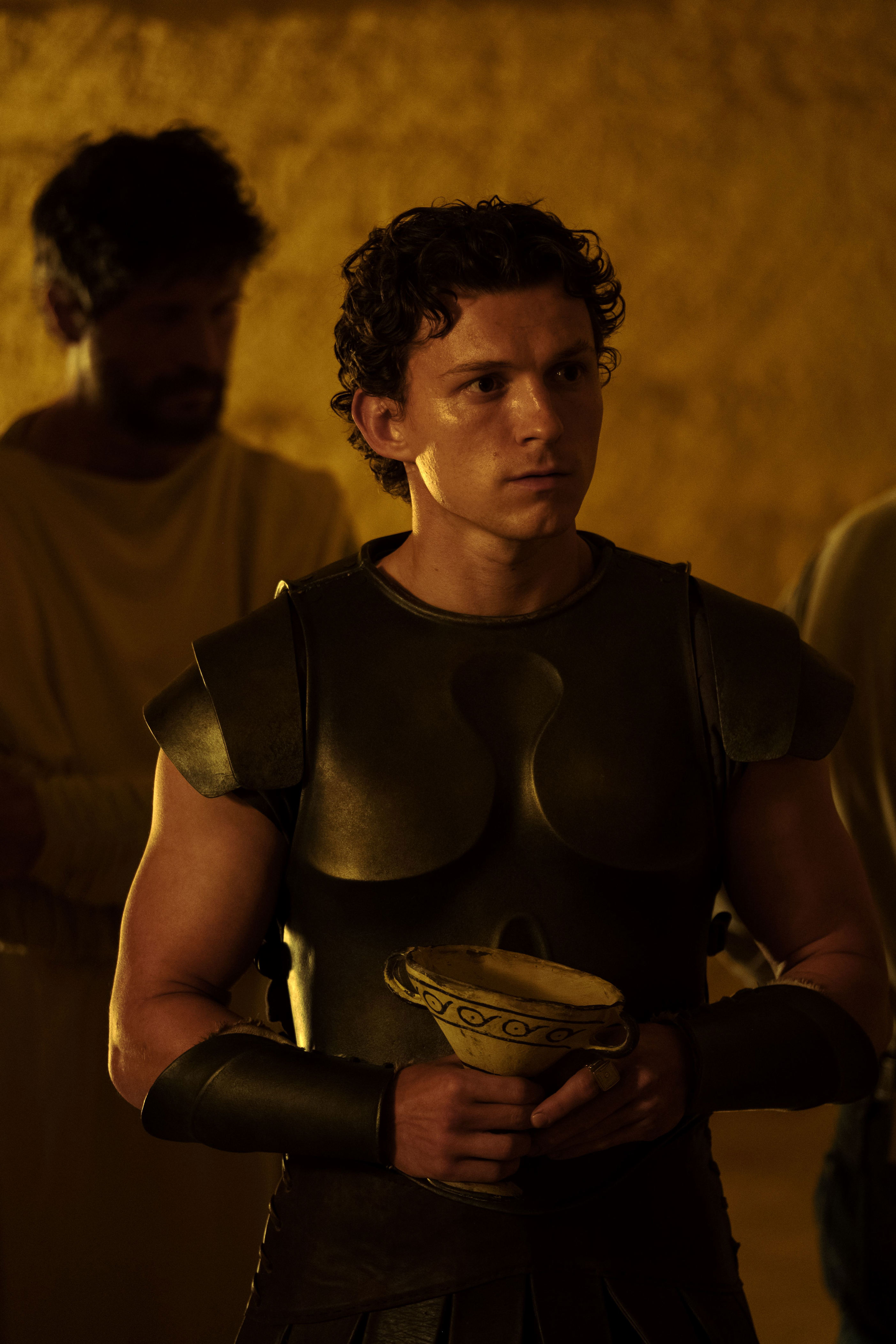 Tom Holland's curls were enhanced with mousse for his role as Telemachus.