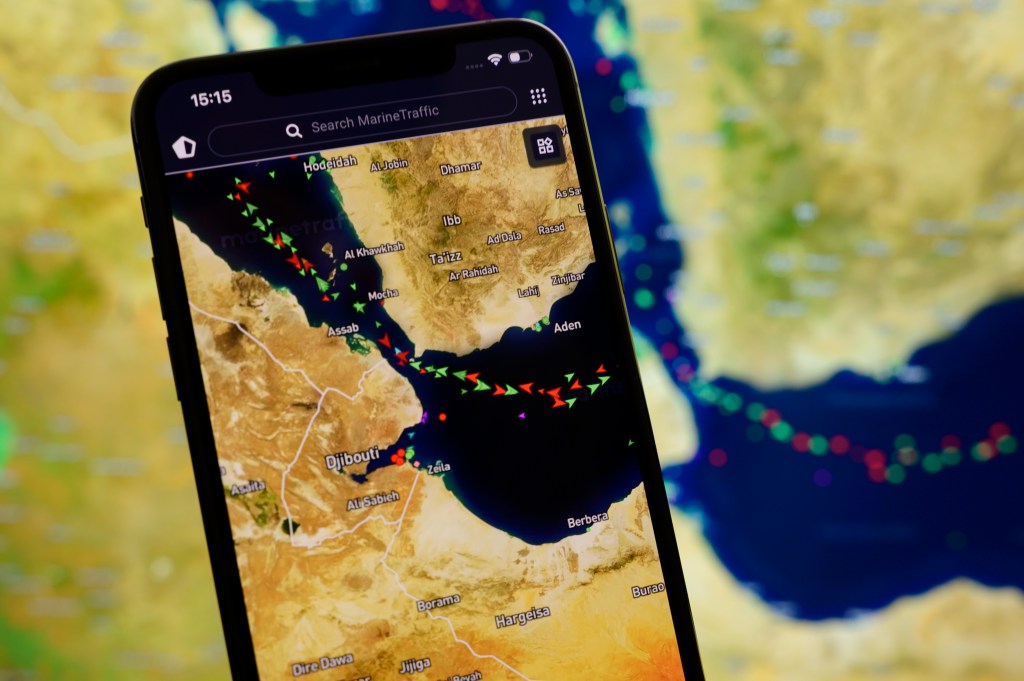 smartphone-screen-displays-marinetraffic-map-135007536