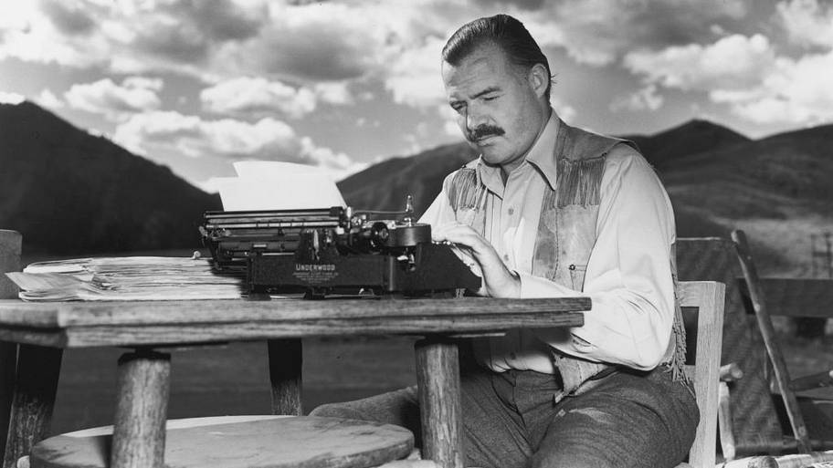 Ernest Hemingway typing on a typewriter in Idaho in 1939.