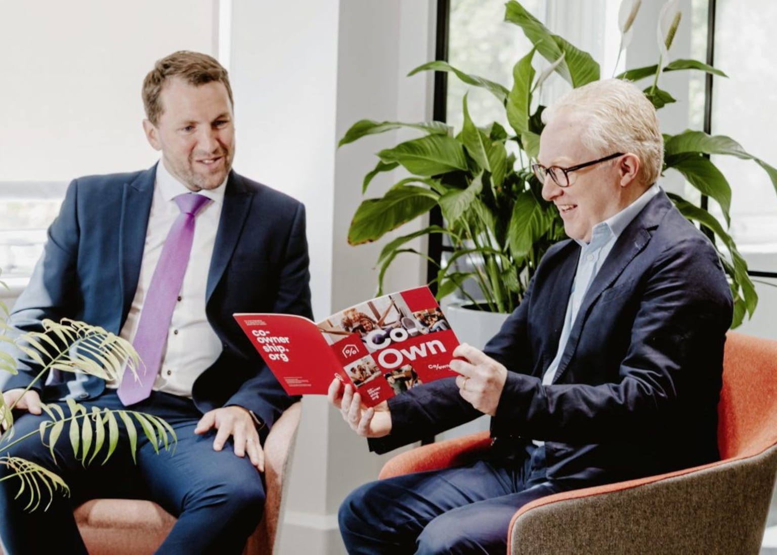Adrian Carville (left), associate director at Bank of Ireland, with Andrew Shott, finance director at Co-Ownership, when a seven-year funding agreement was signed between both parties in 2022
