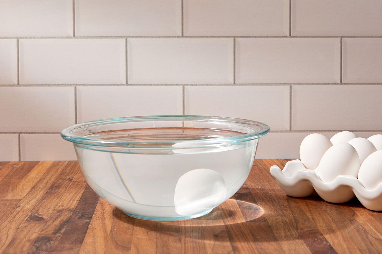 Egg in bowl of water