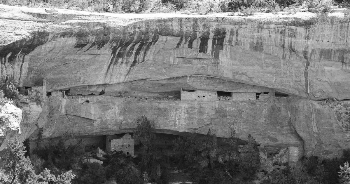 Explore the historical cliff dwellings nestled in Mesa Verde's canyons, capturing ancient architecture.