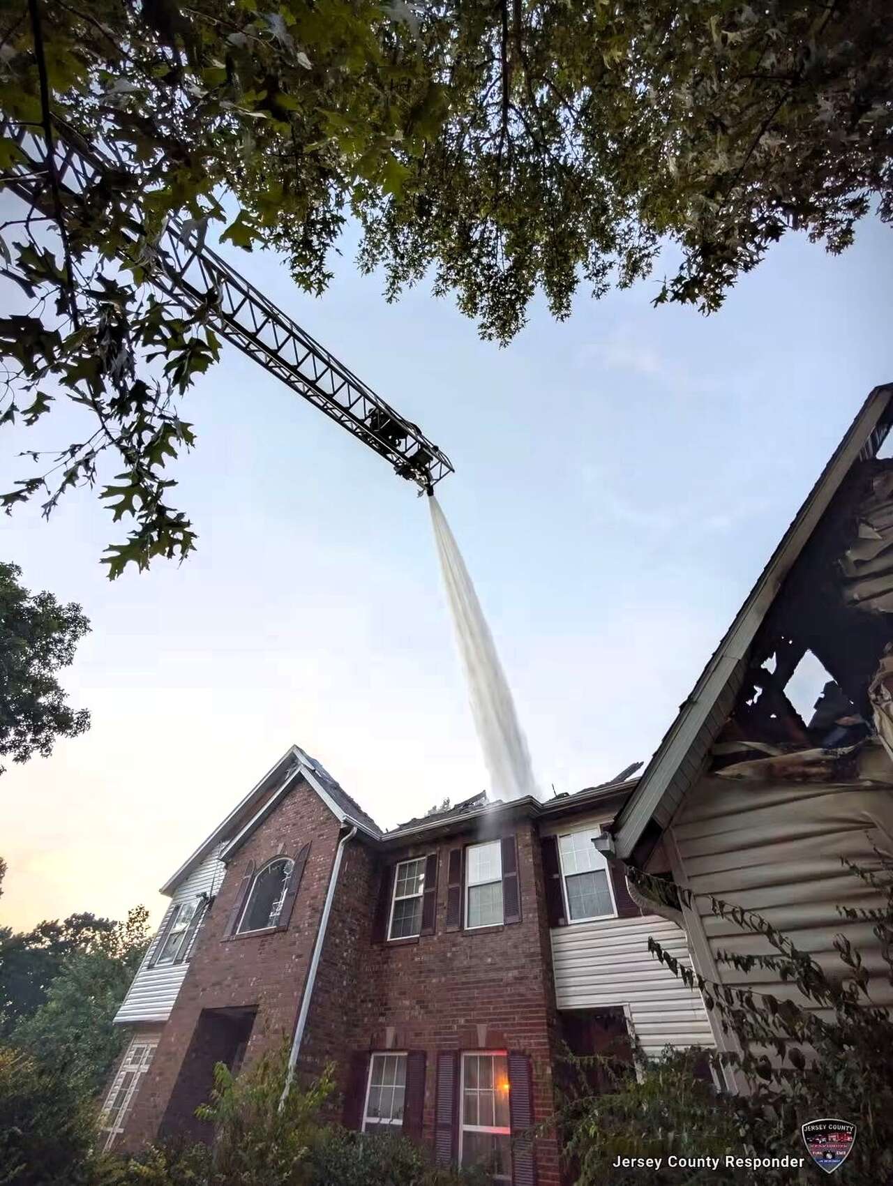 Vehicle fire in garage destroys most of Grafton home