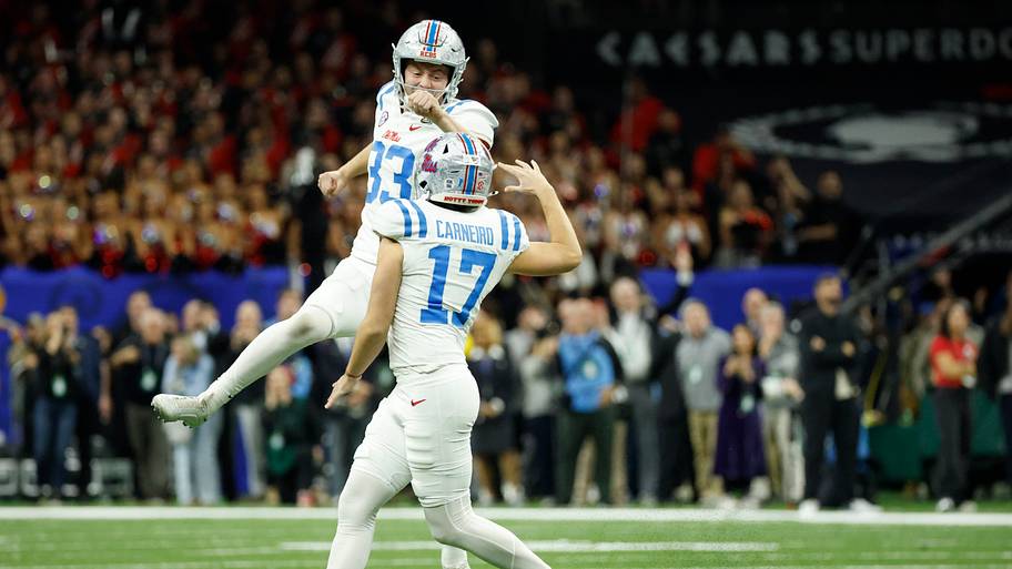 Ole Miss Rebels place kicker Lucas Carneiro (17) celebrates with Ole Miss Rebels punter Oscar Bird (33) after kicking