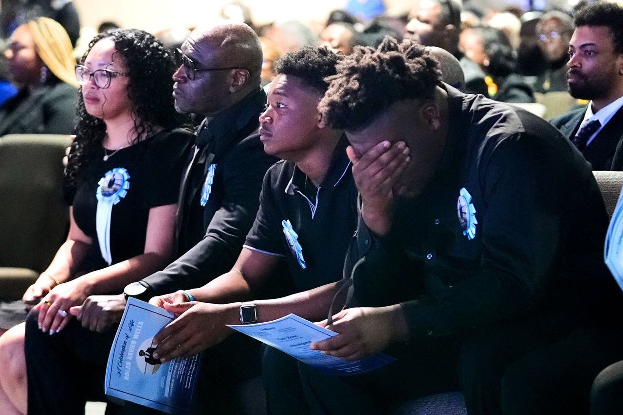 The Wonsley family, from left to right, Christine, her Husband Elmore, sons Elmore Jr. and Ethan attend a memorial service Nolan Xavier Wells, an 18-year-old found dead after taking a July 4 boat trip with friends, Monday, July 20, 2026, in Ocean Springs, Miss.