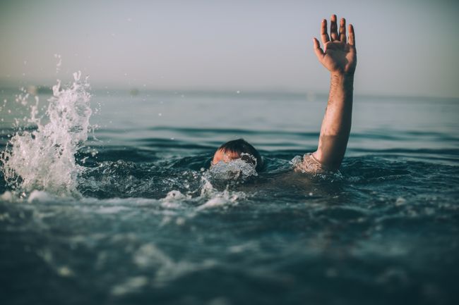 Man Having Difficulty Swimming