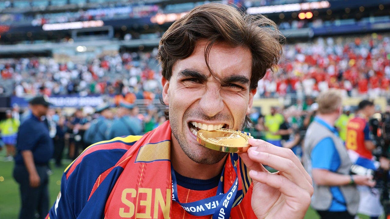 Ferran Torres of Spain celebrates with his medal after the team's victory over Argentina in the FIFA World Cup 2026 Final match at New York New Jersey Stadium in East Rutherford, N.J., on July 19, 2026.
