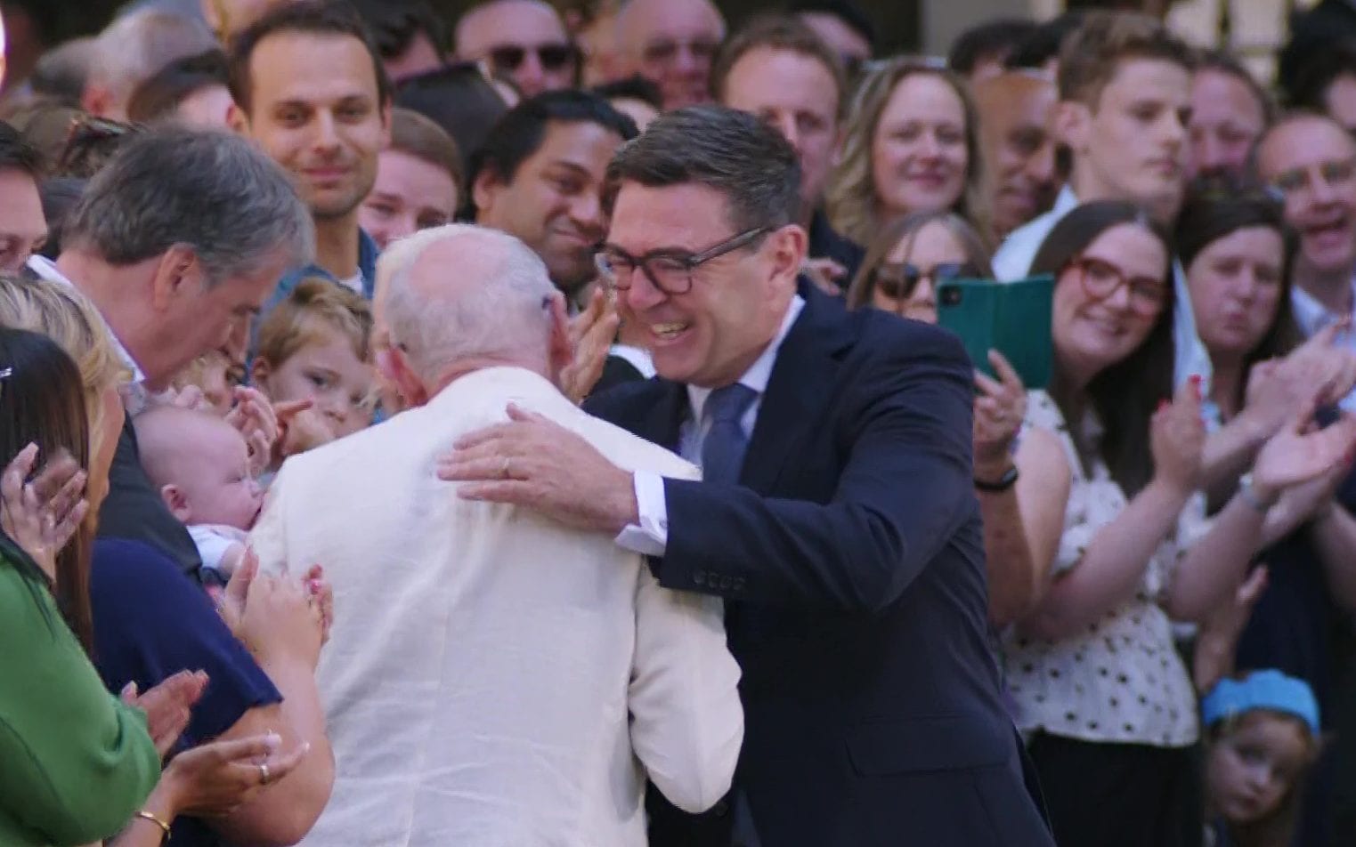 Andy Burnham greeting crowds on Downing Street