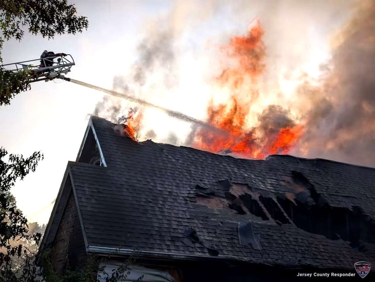 Vehicle fire in garage destroys most of Grafton home