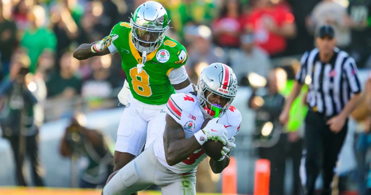 Ohio State Buckeyes wide receiver Jeremiah Smith catches a pass against the Oregon Ducks. (Photo by: Eric Becker/ScoopDuckOn3)