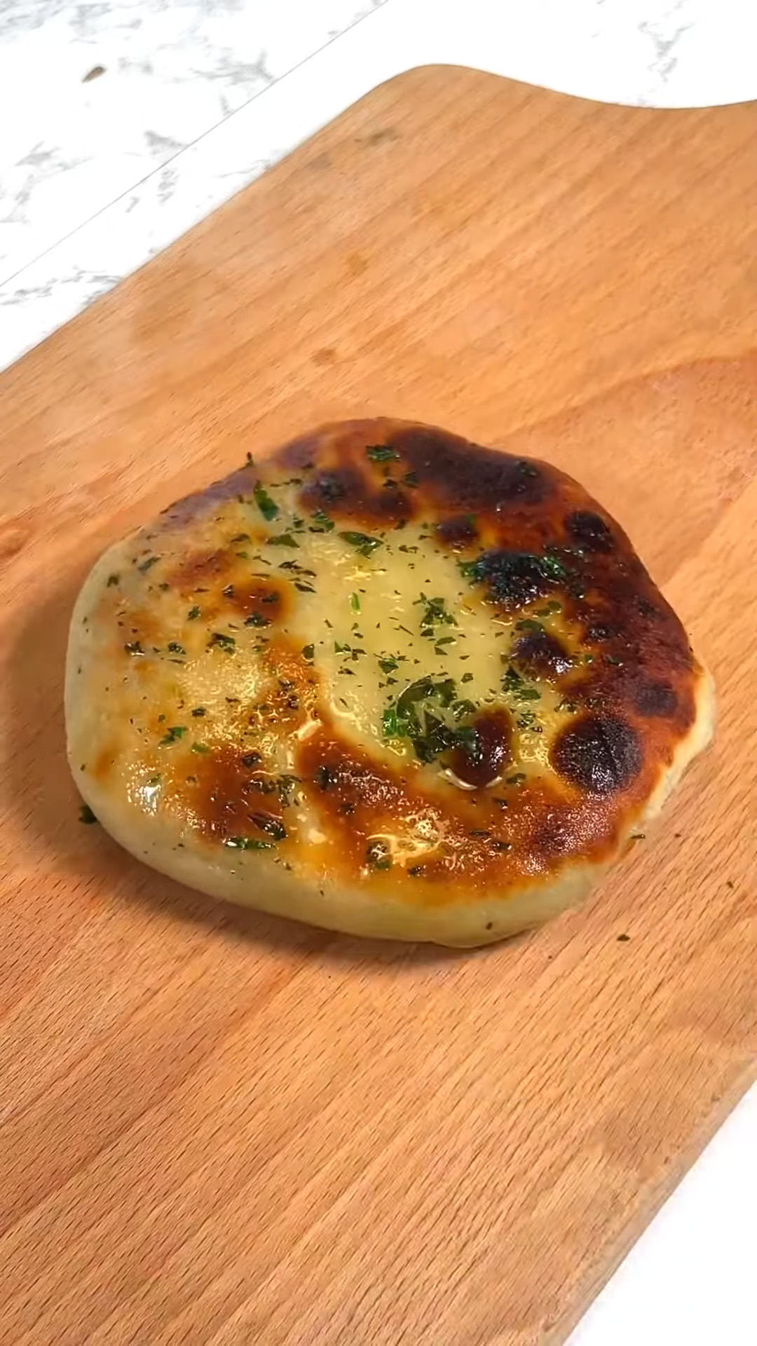 Stuffed vegan flatbread made with spinach