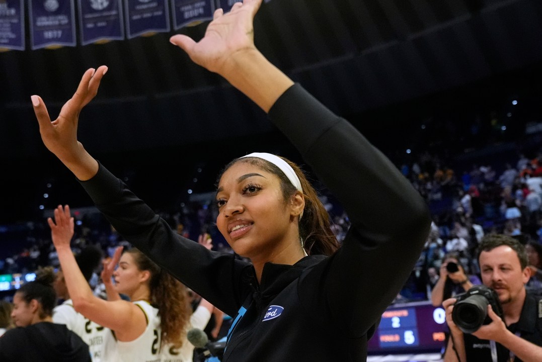 Chicago Sky forward Angel Reese responds to the crowd after a WNBA exhibition basketball game against Brazil in Baton Rouge, La., Friday, May 2, 2025. (AP Photo/Gerald Herbert)