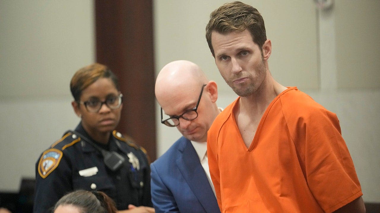Defense attorney Ed McClees and his client, Lee Mongerson Gilley, appear in the 497th District Court at the Harris County Justice Center in Houston on Oct. 17, 2024. Gilley is charged with capital murder in the death of his wife, Christa Gilley.