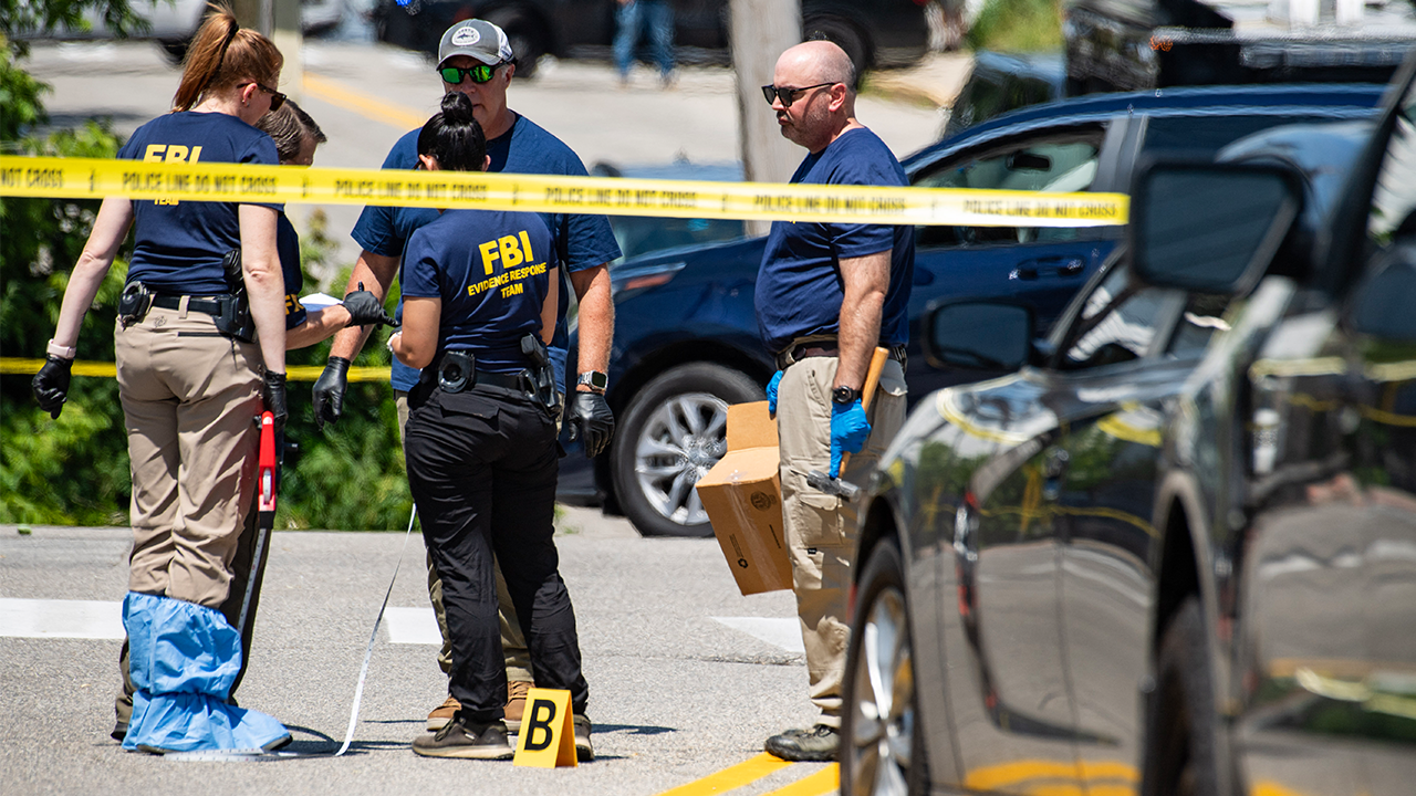 FBI investigators work the scene of an alleged ICE involved shooting in Biddeford, Maine, on July 13, 2026. A person was killed Monday in a shooting involving Immigration and Customs Enforcement (ICE) agents in Maine, an official said. The incident comes after an ICE agent last week shot dead a Mexican man during an operation in Houston, Texas.