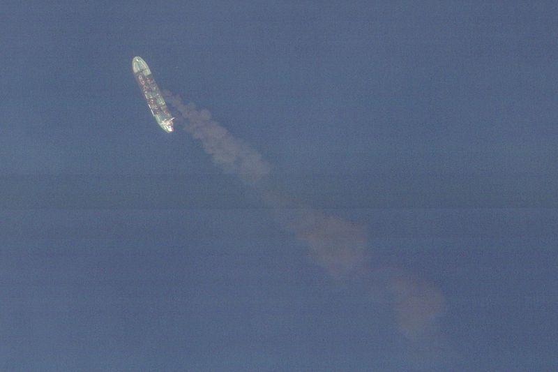 FILE PHOTO: Tanker ship Sounion burns after attack by Yemen's Houthi militants in Red Sea in 2024
