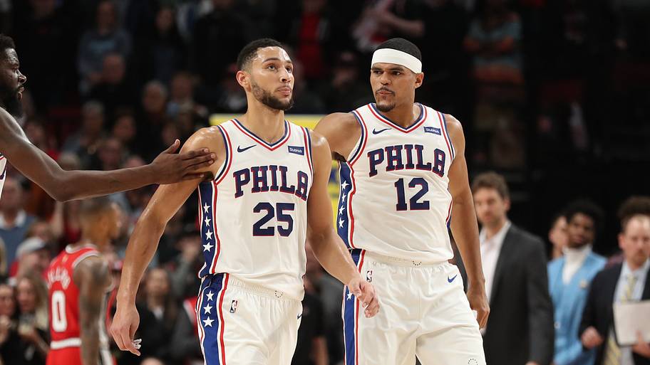 76ers forward Tobias Harris (12) celebrates with teammate Ben Simmons.