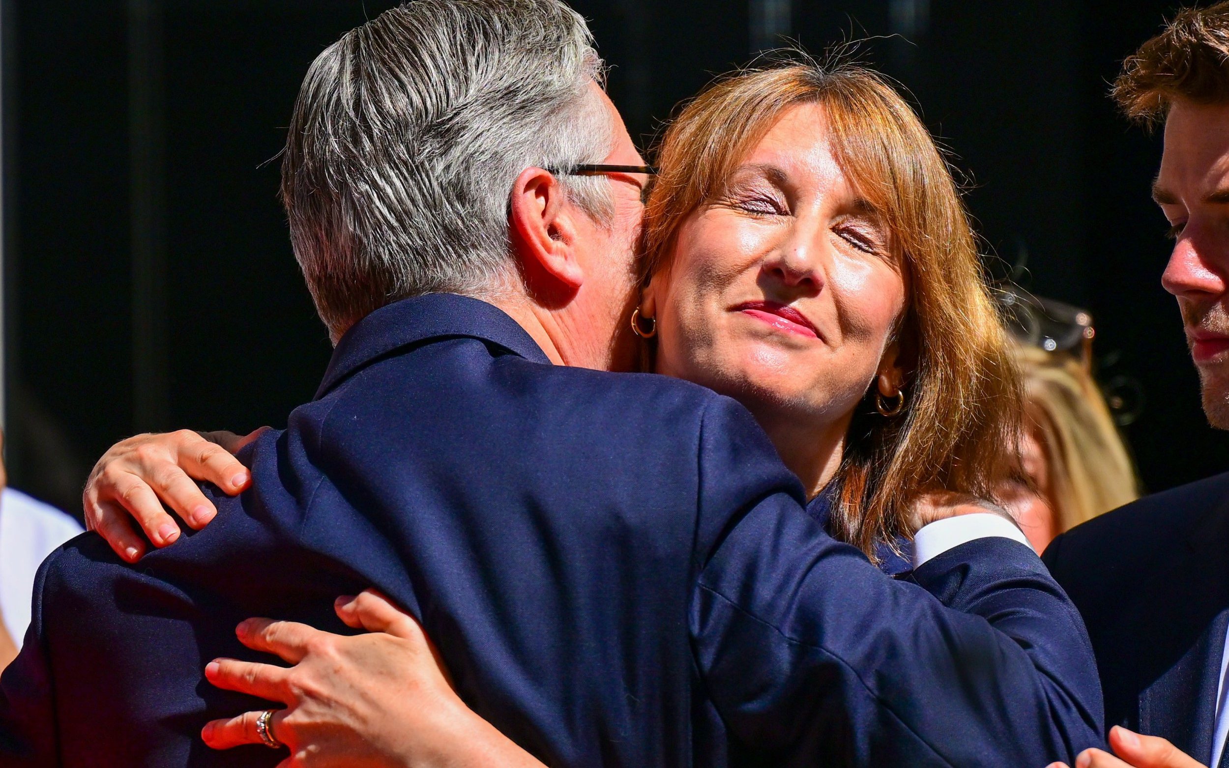 Sir Keir hugging Rachel Reeves, his Chancellor, after his final speech as Prime Minister