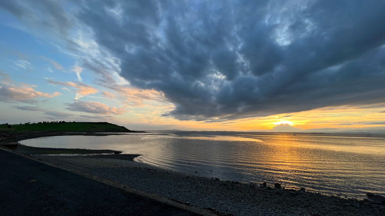 Golden sunset over Lough Neagh in Northern Ireland with clouds spread out above
