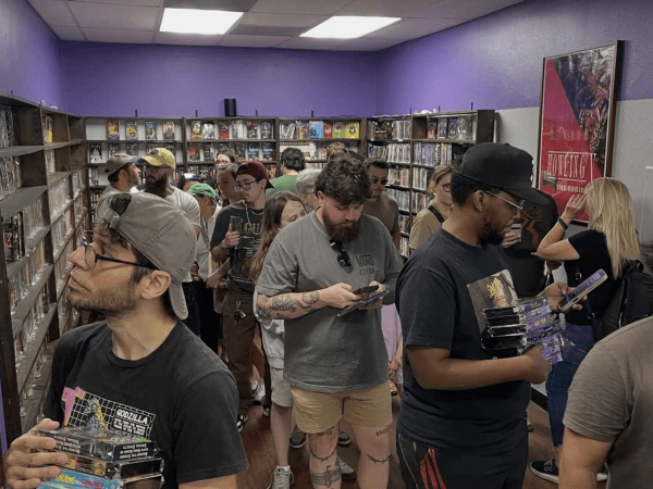 Customers browse VHS tapes, DVDs, Blu-rays and other physical media during a busy day at Austin Video Store, a recently opened shop near Austin-Bergstrom International Airport. | Austin Video Store/Facebook