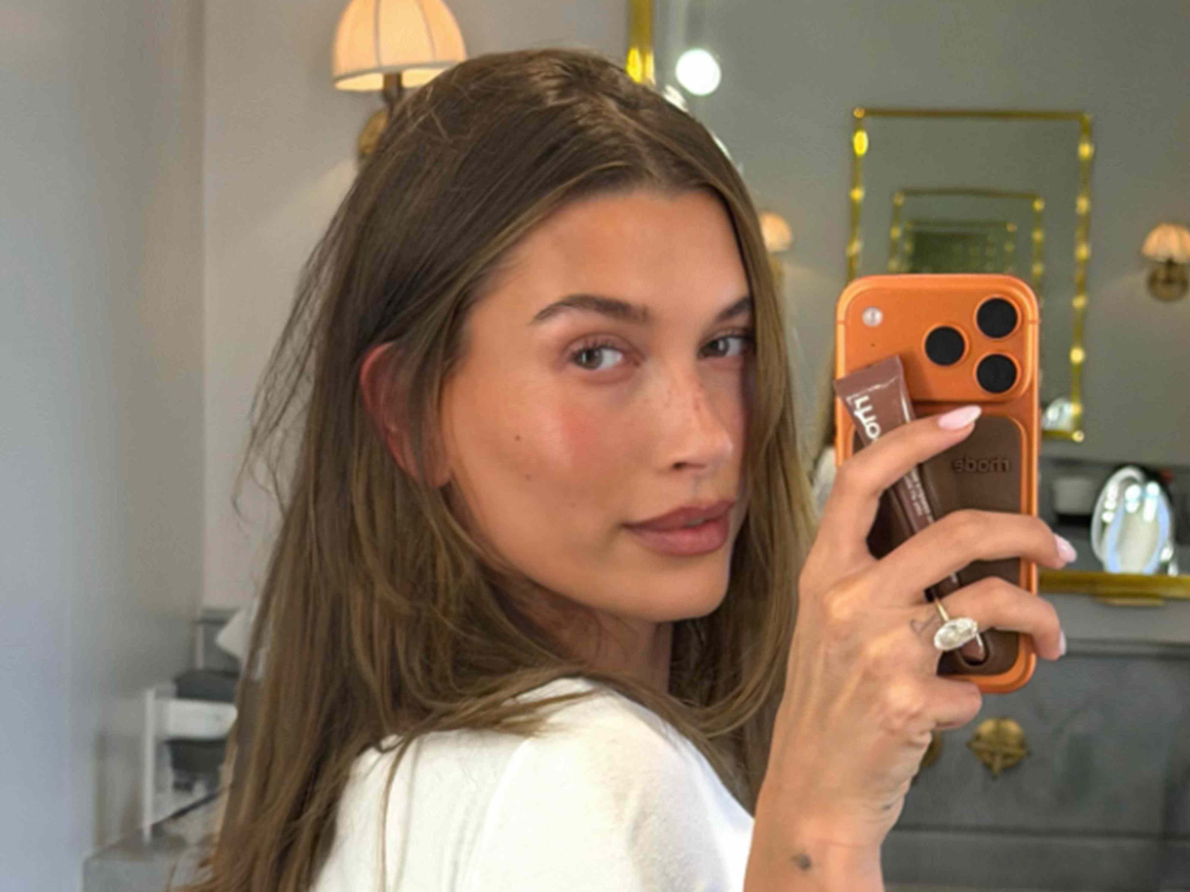 Hailey Bieber just proved that heeled flip-flops go with anything—even vintage Dior