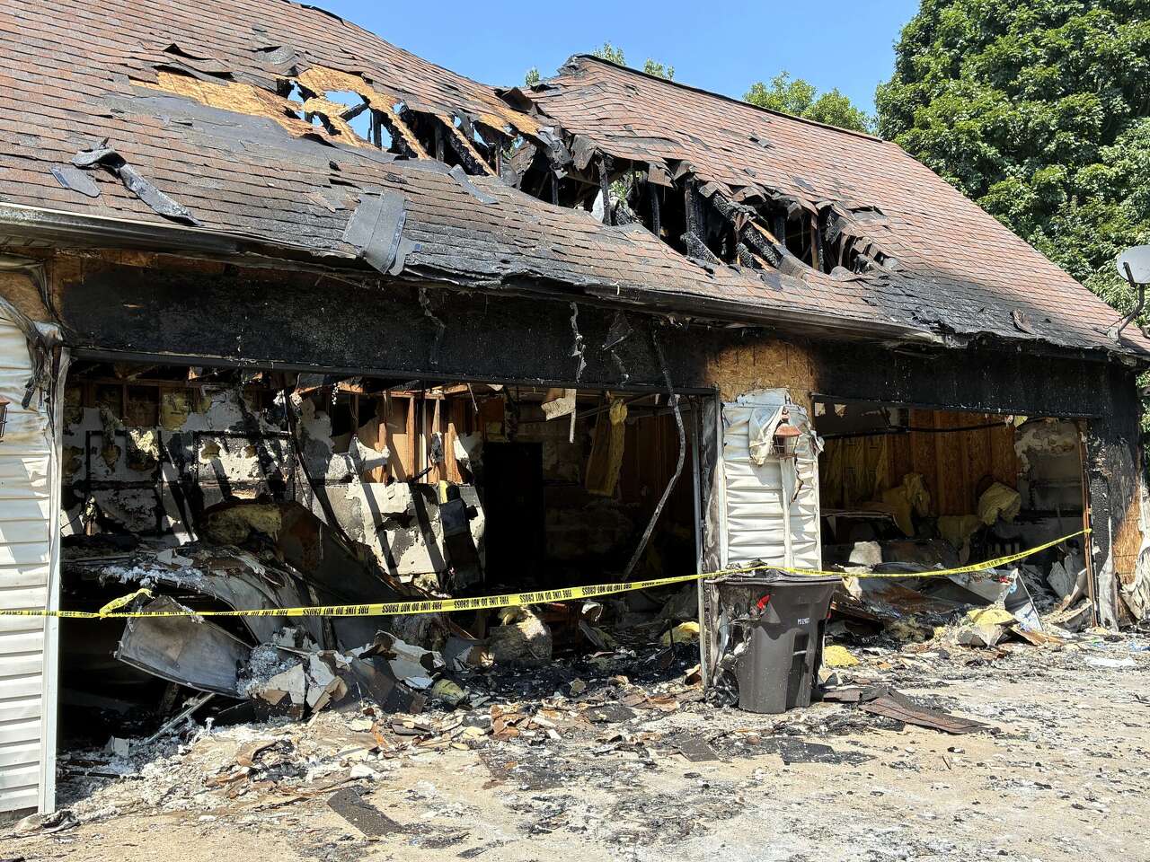 Vehicle fire in garage destroys most of Grafton home