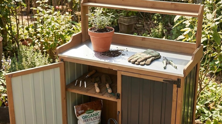 The Ketive outdoor potting bench and storage cabinet available from Amazon