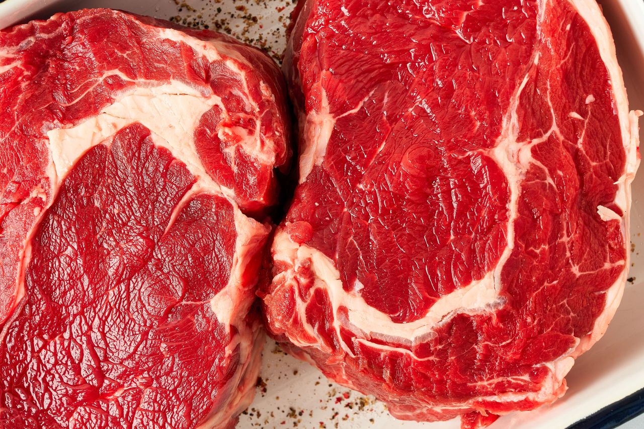 Two raw steaks closeup view