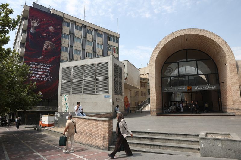 A billboard depicting U.S. President Donald Trump and Israeli Prime Minister Benjamin Netanyahu on a building in Tehran