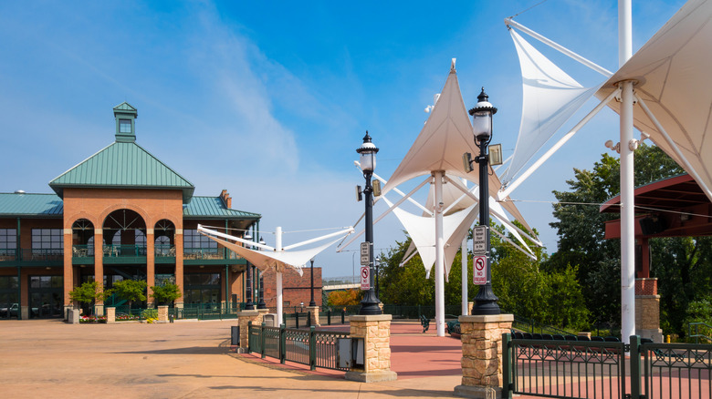 Ohio's River With Waterfalls Runs Through A Vibrant Downtown In A City With Charming Brews And Surreal Views