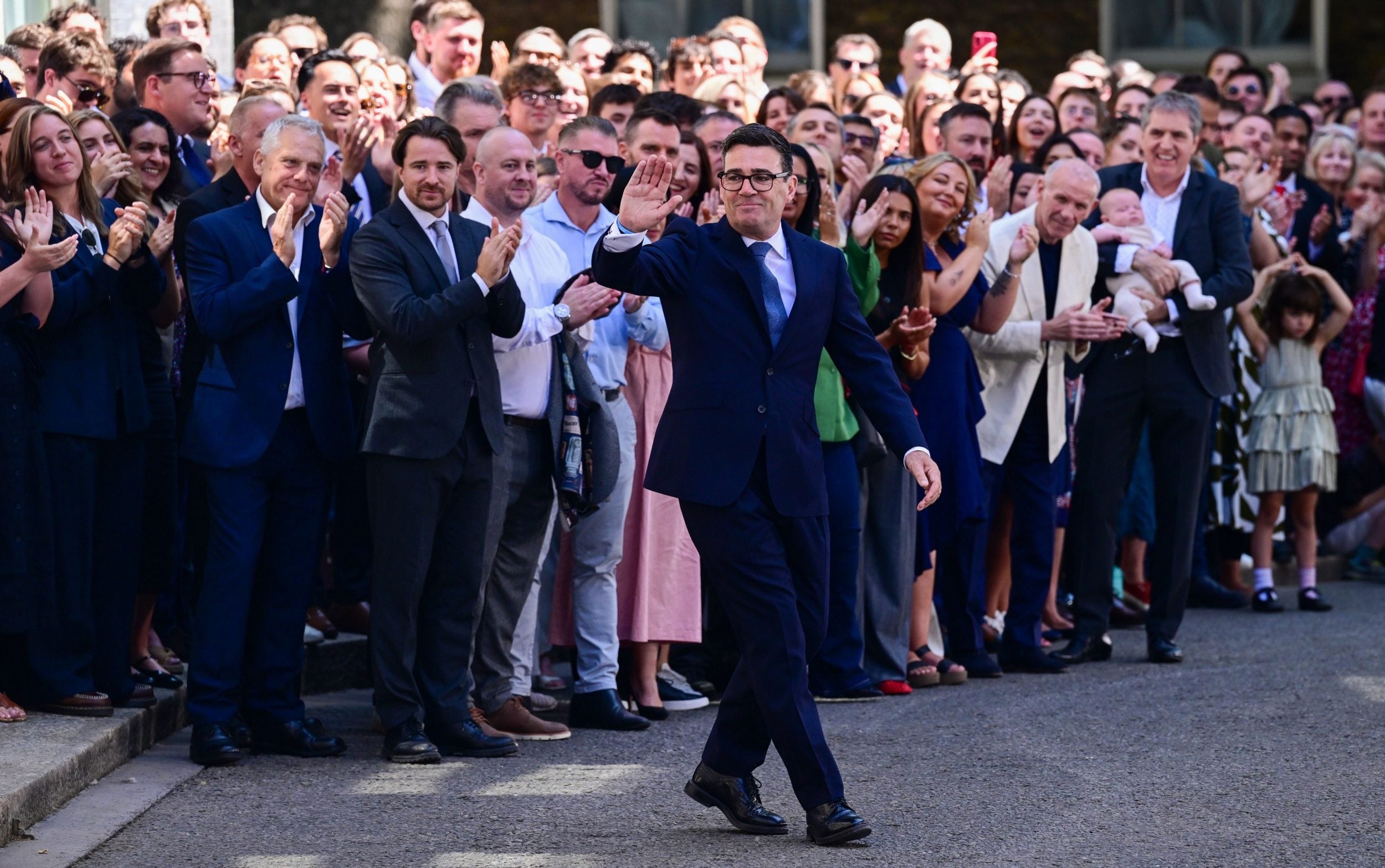 The new Prime Minister waving to crowds outside Downing Street this morning