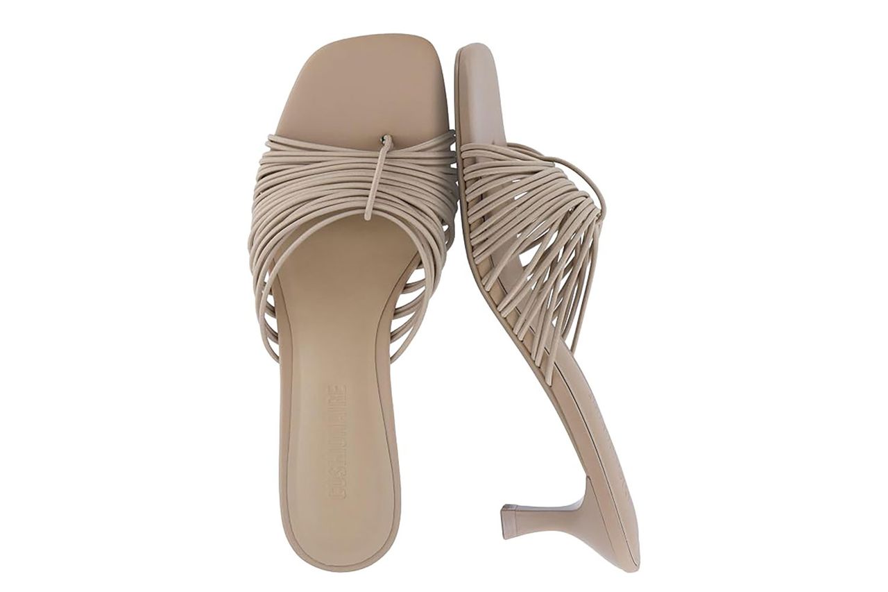 A pair of strappy kitten heel sandals with a square toe design
