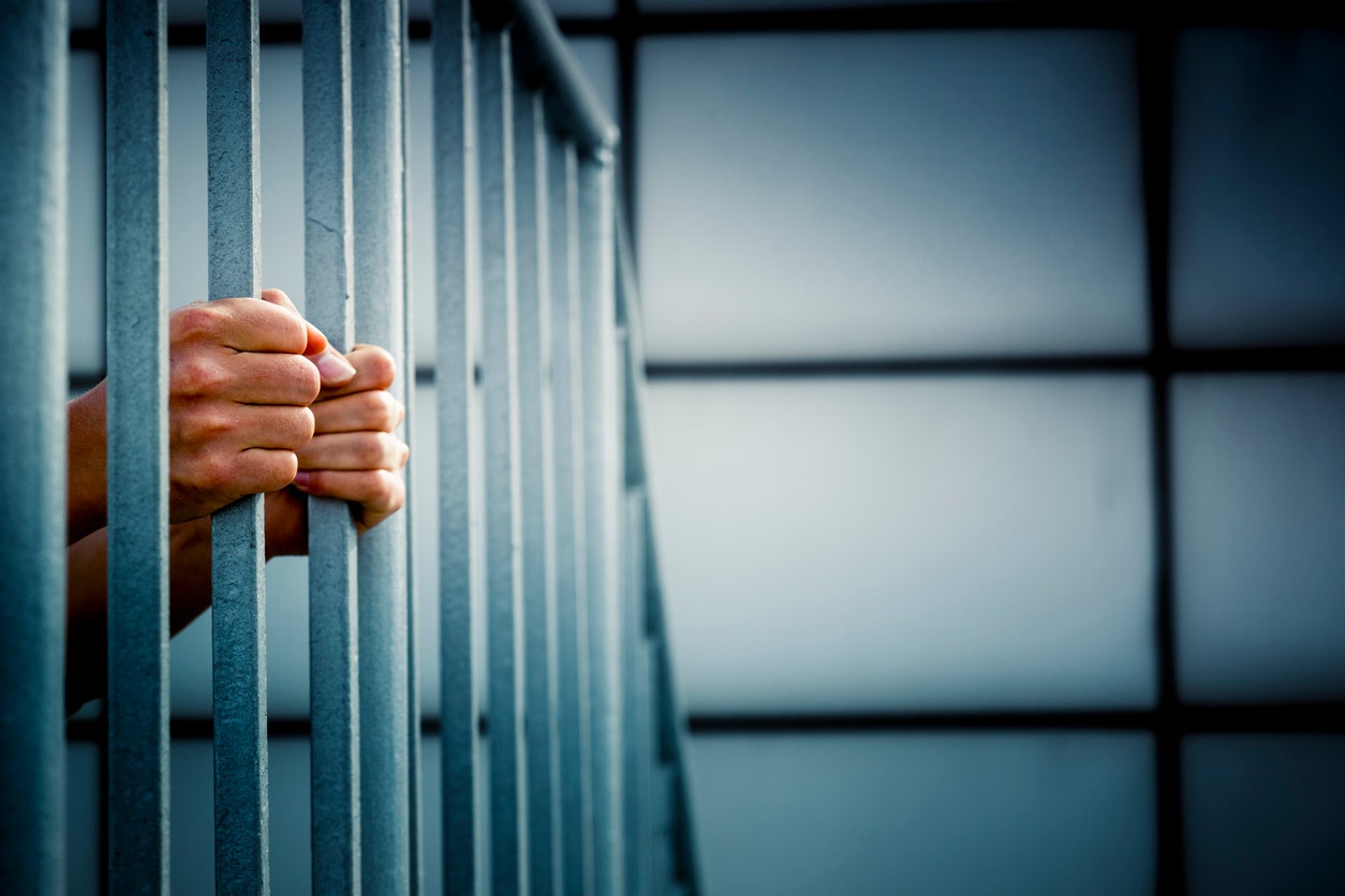 Prisoner in the jail cell