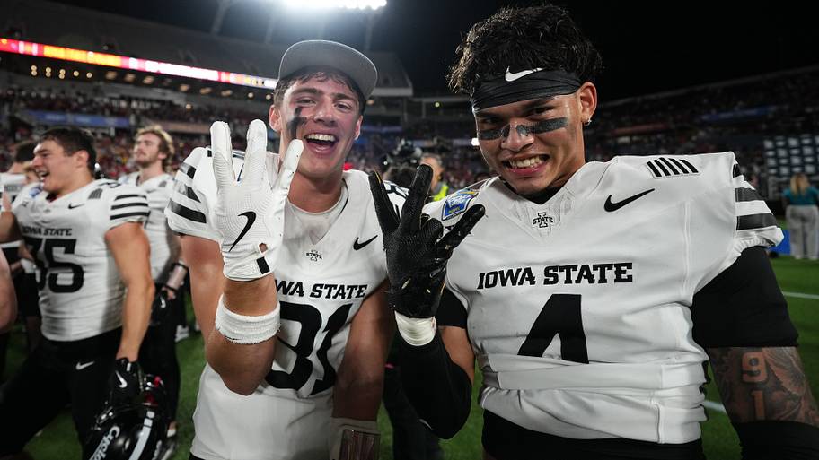 Iowa State Cyclones wide receiver Brett Eskildsen (81) and defensive back Jeremiah Cooper (4) celebrate a bowl win.