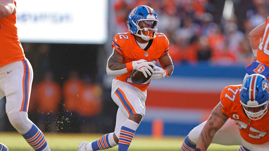 Jan 4, 2026; Denver, Colorado, USA; Denver Broncos running back RJ Harvey (12) runs with the ball against the Los Angeles Cha