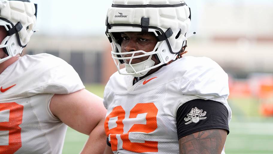 Oklahoma State's Jerry Lawson lines up for a football defensive drill during a workout