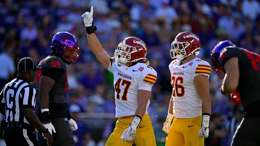 Iowa State Cyclones linebackers Kooper Ebel (47) and Caleb Bacon (26) celebrates a defensive stop vs. the TCU Horned Frogs.