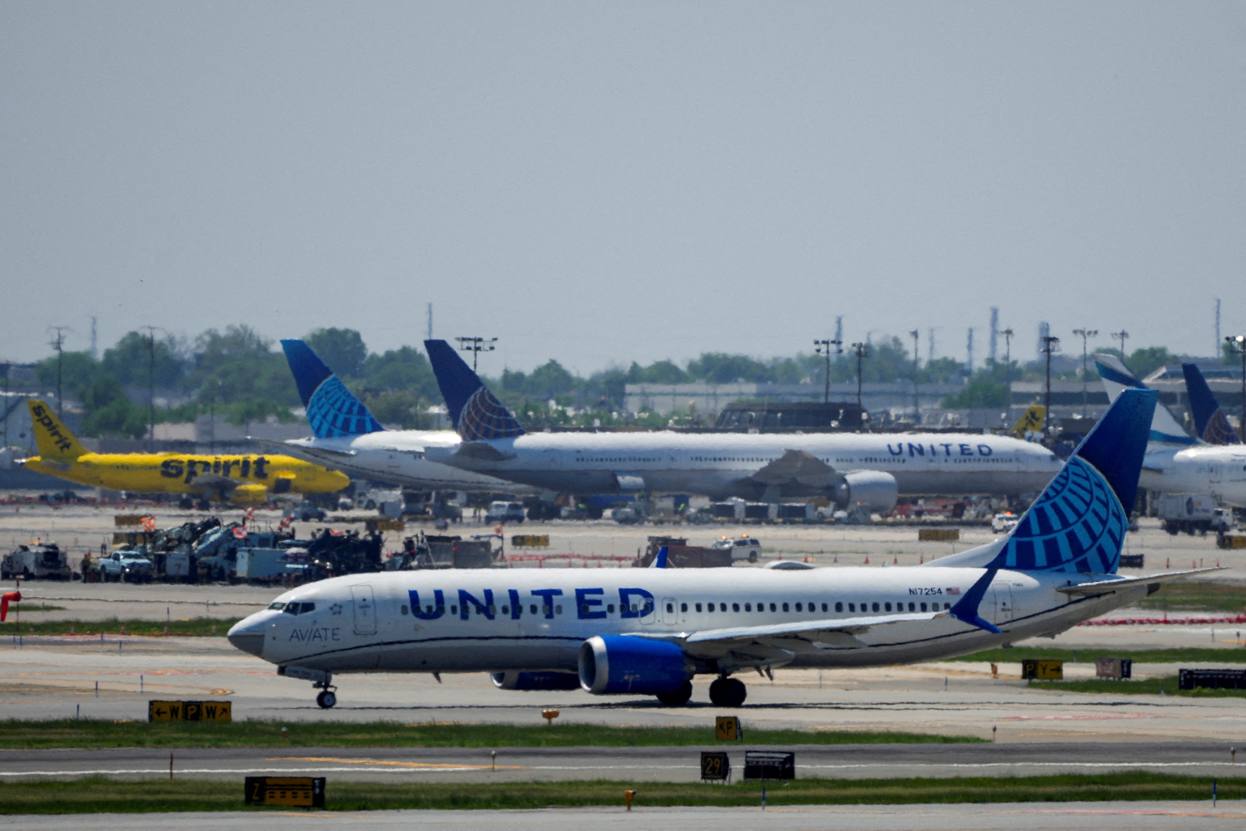 United probing incident after employee's ICE threat caught on video