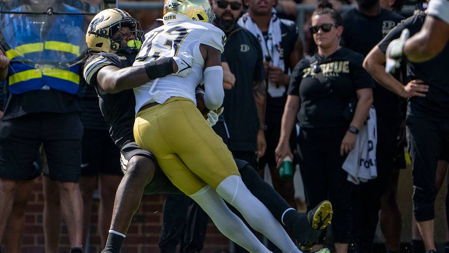 Notre Dame Fighting Irish wide receiver Jayden Thomas (83) is tackled by Purdue Boilermakers defensive end CJ Madden (8).