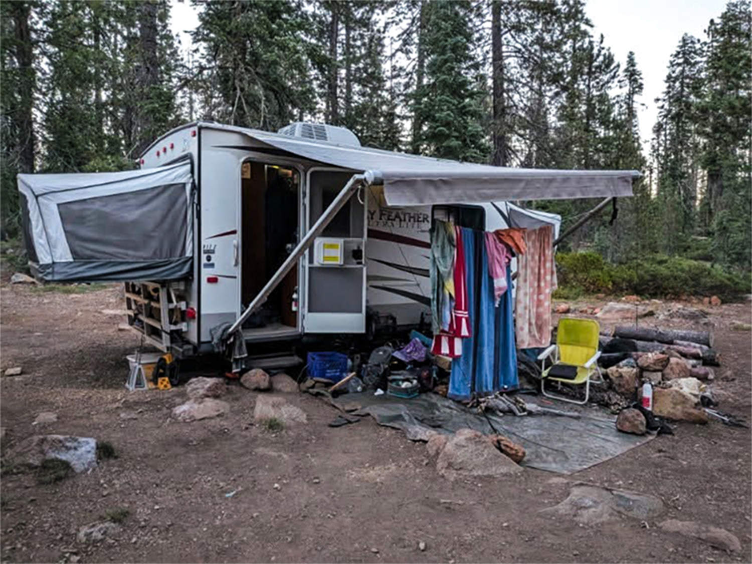 Father, son charged with kidnapping 2 US Forest Service biologists at gunpoint