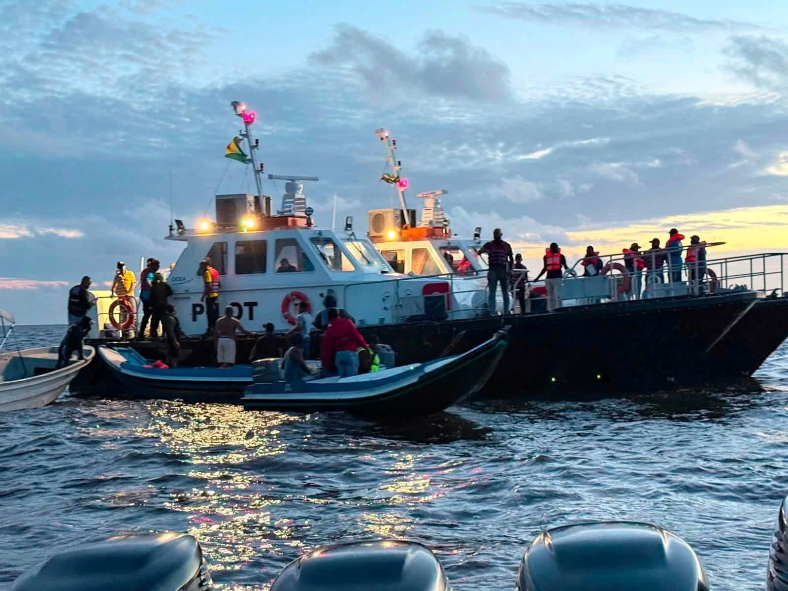 Rescue efforts progress after MV Barima, a ferry carrying people, capsized off the coast of Guyana in South America, in this handout image released on July 19, 2026.