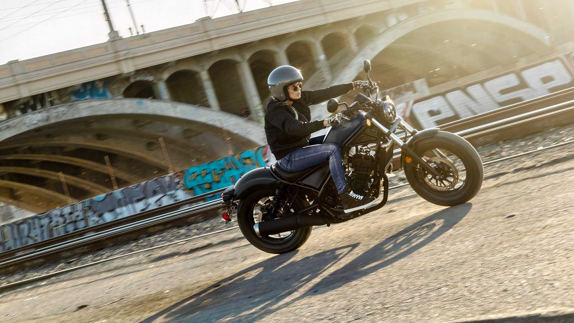 2026 Honda Rebel 300 E-Clutch action riding shot side