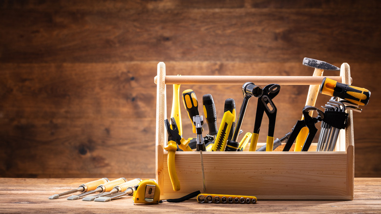 tools in a wooden toolbox