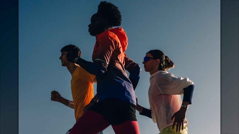 Runners wearing Apple Watch Series 11