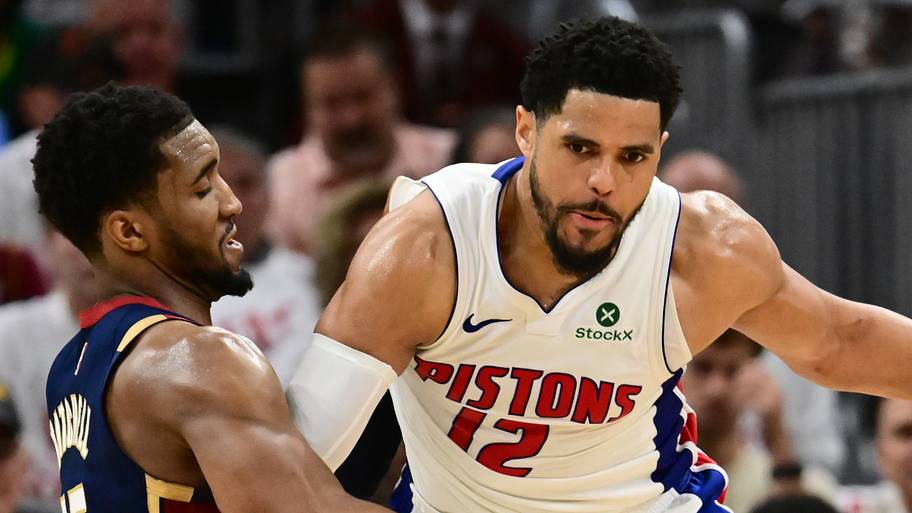 Detroit Pistons forward Tobias Harris (12) drives to the basket against Cleveland Cavaliers guard Donovan Mitchell (45).